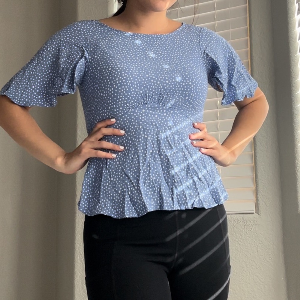 Sky blue blouse with white polka dots